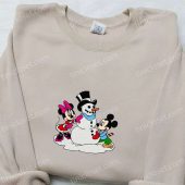 Mickey And Minnie Building Snowman Embroidered Shirt Disney Characters Embroidered Hoodie Best Christmas Gifts For Family 5.jpg - demo10